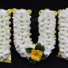 Letters MUM in Yellow