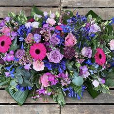 Vibrant casket spray