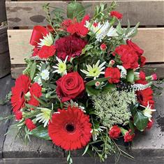 Red, Cream and green linear posy