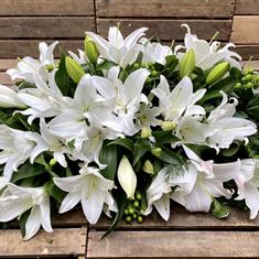 Lily floral casket spray