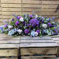 Mauve and Blue Casket spray