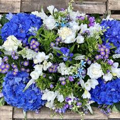 Blue and White Full ended Casket spray