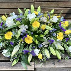 Purple gold and cream Casket spray