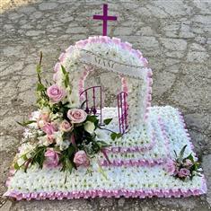 Pink and white gates of heaven with 3 steps