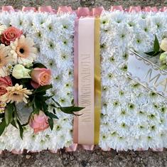 Open book in peach and cream 
