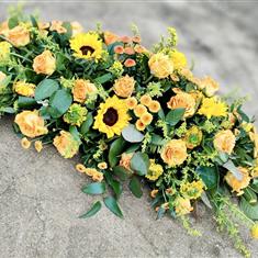 Sunflower and orange casket spray 5ft 