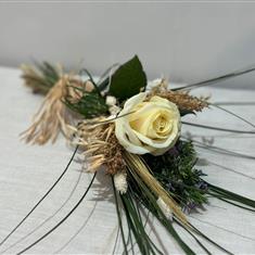 Single rose with grasses and dried flowers