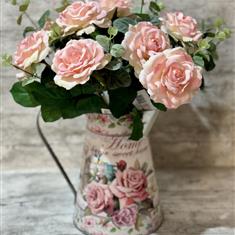 Artificial garden roses in zinc container