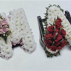 Classic letter with ribbon or foliage